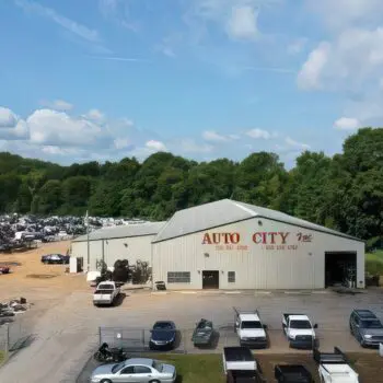 Auto parts warehouse with vehicles